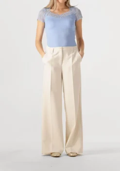 UNISA en ballerina's betar goud