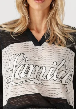 HAUTE L'AMITIÉ e haute l'amitié blouses drift mix logo blouse zwart Clearance